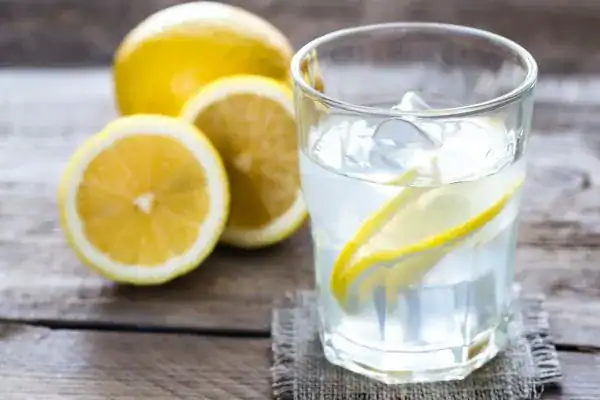 Hydration: The Secret Ingredient for a Toned Stomach and Enhanced Fitness 2 Image of lemon water to aid hydration Aldridge