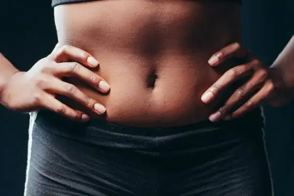 Toning Your Stomach: The Ultimate Guide to Achieving a Sculpted Stomach While Shedding Pounds 1 Image of a toned stomach after non surgical treatment Aldridge